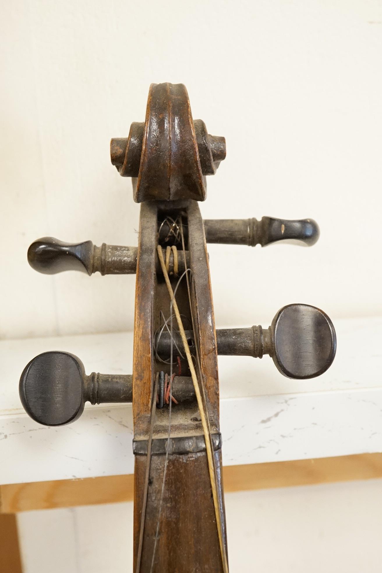A 19th century violin, and a cased Boosey & Hawkes clarinet